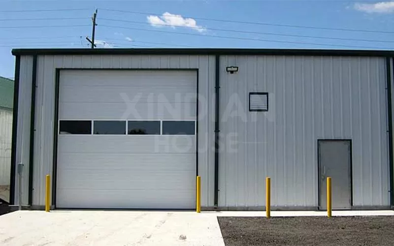 The steel structure serves as a garage for vehicle protection