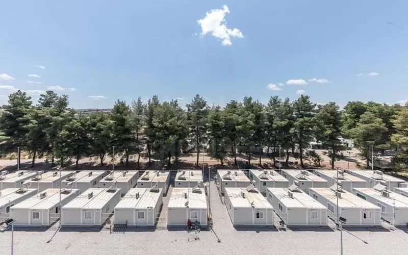 Modular containerized housing for disaster relief camps