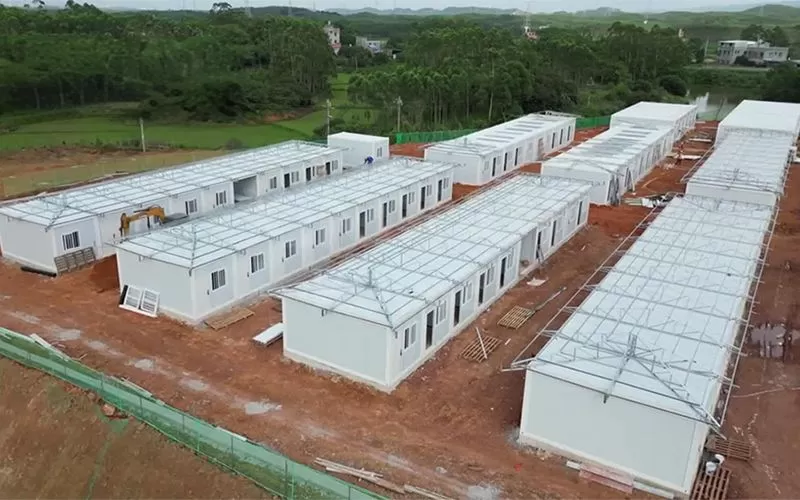 Modular containerized housing for disaster relief camps